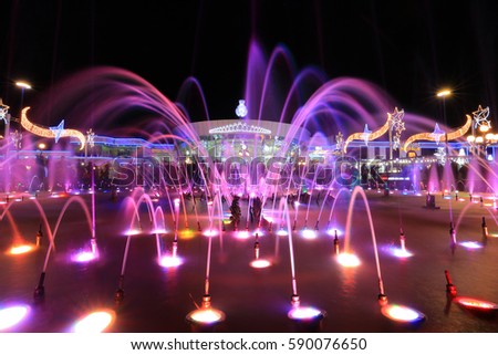 Colorful fountain at night in Soho square in Sharm El Sheikh, Egypt Royalty-Free Stock Photo #590076650