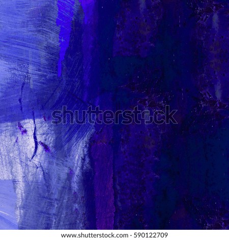 Brushstrokes of blue paint