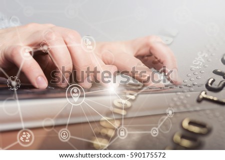 Female hand typing on laptop computer keyboard. Internet security concept