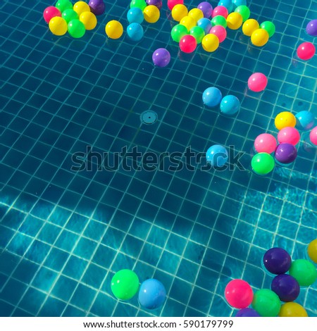 Colorful small ball in the swimming pool.