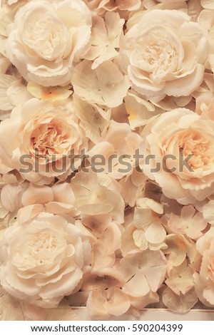 artificial flowers made of fabric attached to the canvas delicate pastel shades