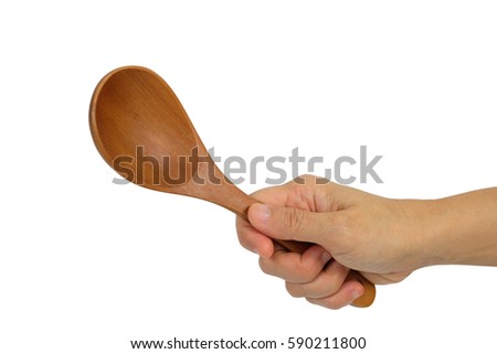 Hand is holding a ladle isolated on white background.