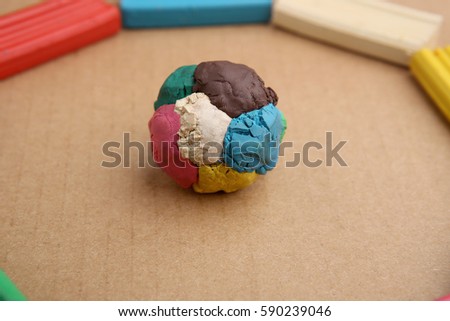 Children's colored plasticine. Materials for creativity. Colorful plasticine ball.