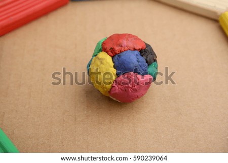 Children's colored plasticine. Materials for creativity. Colorful plasticine ball.