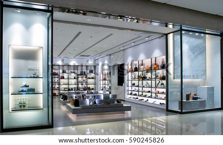 modern fashion storefront in mall Royalty-Free Stock Photo #590245826