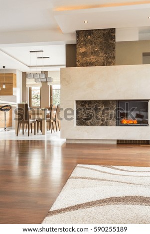 Picture of fireplace in beige living room