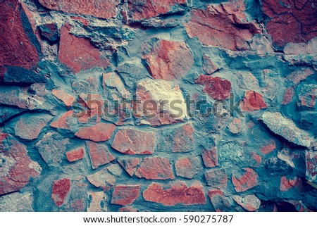 Blue red dark vintage stone wall background.