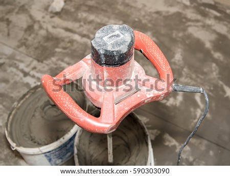 Closeup photo of used stirrer machine in construction