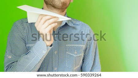 man and paper airplane