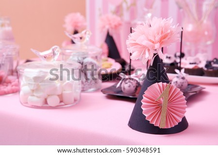 Birthday hat on table prepared for party