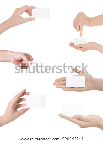 Woman hand hold virtual business card, credit card or blank paper isolated on white background.Clipping path included.Hand holding blank business card with clipping paths