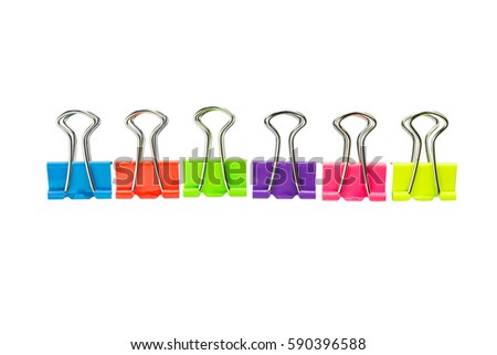 Colorful paper clips isolated on a white background, top photo of various office supplies with clipping path.