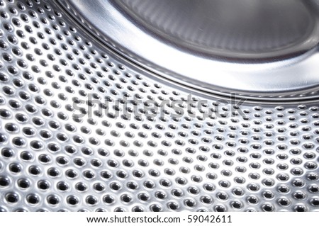 washing machine drum background with copyspace showing household concept