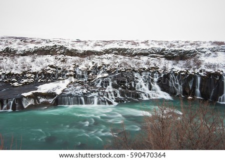 Hraunfossar waterfall in winter iceland