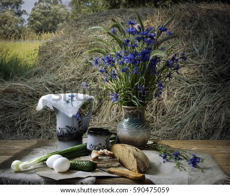 Still life whith lunch upon haymaking