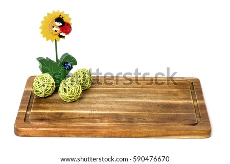 Spring, Easter, summer: Colorful carved sunflower with red and blue ladybugs on rustically wooden board - isolated on white background
