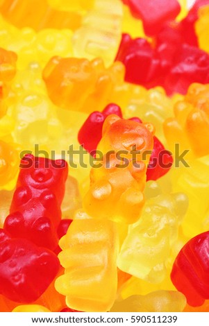 Gummy candy bear background. Gummy bears as texture. Gum bear candy colorful pattern.