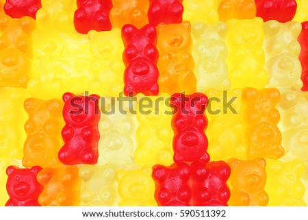 Gummy candy bear background. Gummy bears as texture. Gum bear candy colorful pattern.