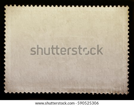 Blank vintage posted stamp isolated on black background. Royalty-Free Stock Photo #590525306
