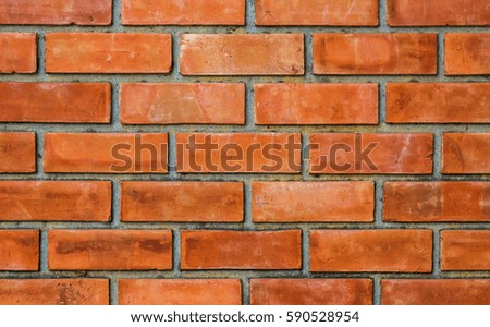 red brick wall texture grunge background with vignetted corners,