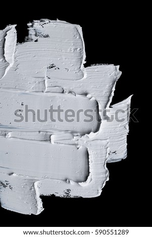 white grunge brush strokes paint on black background