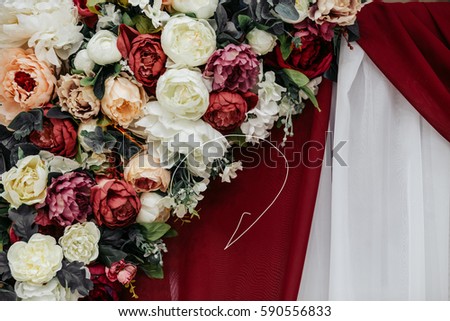 red and white curtain plain background with blooming flowers