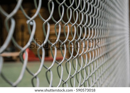 Rusty steel wire mesh fence,soft focus