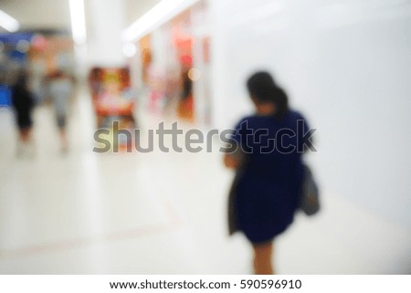 Picture blurred  for background abstract of woman shoping in mall