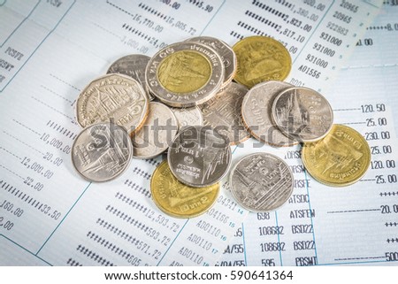 Thai coin on bookbank concept saving money 