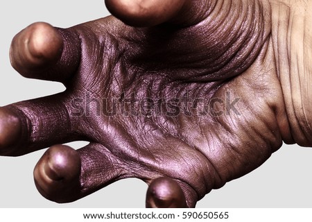 Wrinkled Palm with purple painted Skin