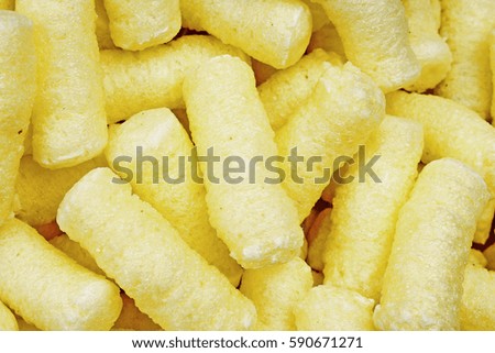 
Cheese puff. Cheese puffs snack background texture food pattern.
