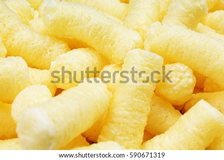 
Cheese puff. Cheese puffs snack background texture food pattern.
