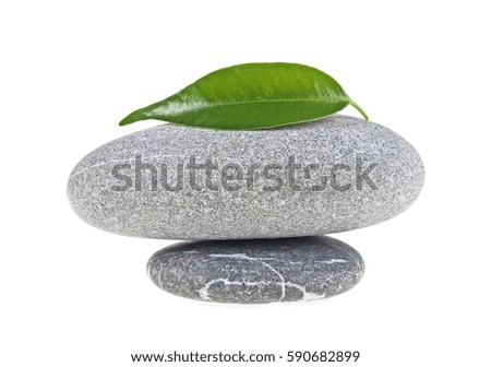 SPA stones with leaf isolated on white background