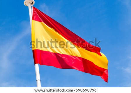flag of spain in the wind