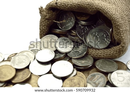 sack bag with coins on the white background