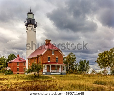Au Sable Point Lighthouse, Storm Clouds red brick -   at Pictured Rocks National Lakeshore  Upper Peninsula Michigan 
