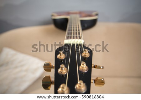 acoustic guitar fretboard close up