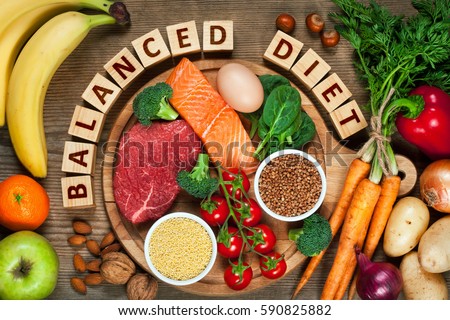 Balanced diet - healthy food on wooden table