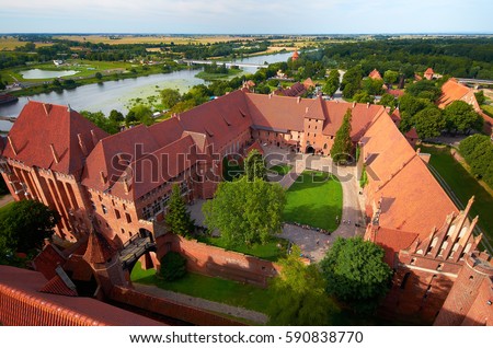 historical knights castle malbork in poland Royalty-Free Stock Photo #590838770