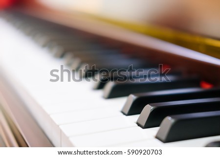 Selective focus of piano keyboard background