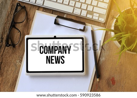 COMPANY NEWS CONCEPT ON TABLET PC SCREEN