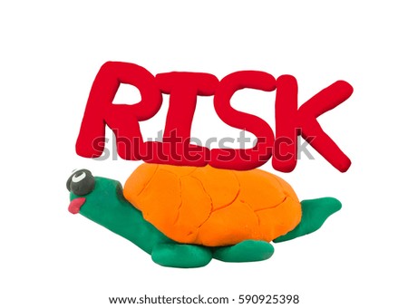 Plasticine red risk on yellow turtle concept slow risk