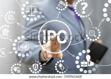 IPO (Initial Public Offering) finance business concept. Businessman touched ipo icon on virtual trading screen. Financial trade exchange investment and strategy technology. Royalty-Free Stock Photo #590961668