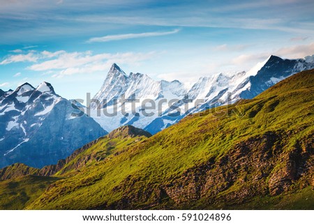 Great view of alpine hill. Picturesque and gorgeous scene. Popular tourist attraction. Location place Swiss alps, Grindelwald valley in the Bernese Oberland, Europe. Discover the world of beauty.