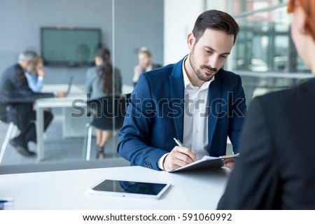 Job interview, businessman listen to candidate answers. Royalty-Free Stock Photo #591060992