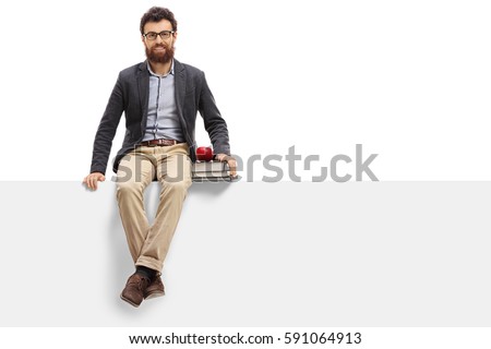 Young teacher sitting on a panel and looking at the camera isolated on white background