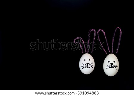 Top view Happy Easter festival background.Design handmade painted cute bunny easter eggs on backboard with copy space.