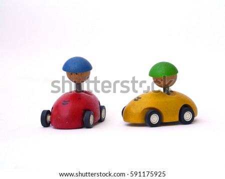 Wooden toy car on white