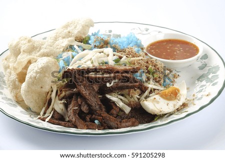 nasi kerabu, blue color rice salad, traditional malaysian cuisine