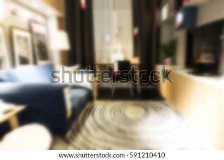 Abstract Blur background of modern living room furniture showroom with chairs sofa rug lighting decoration wooden table for household happy family living visual communication concept design